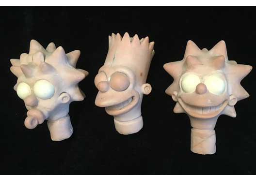 The Simpsons Burger King Toys, the heads were sculpted by Timothy Young
