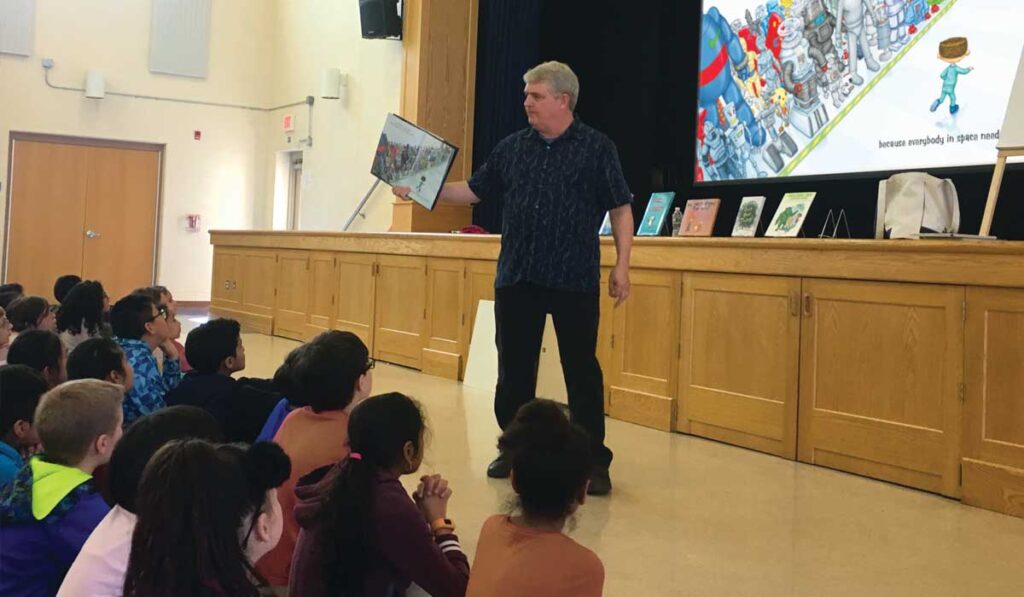 Timothy Young presents in a elementary school in New Jersey